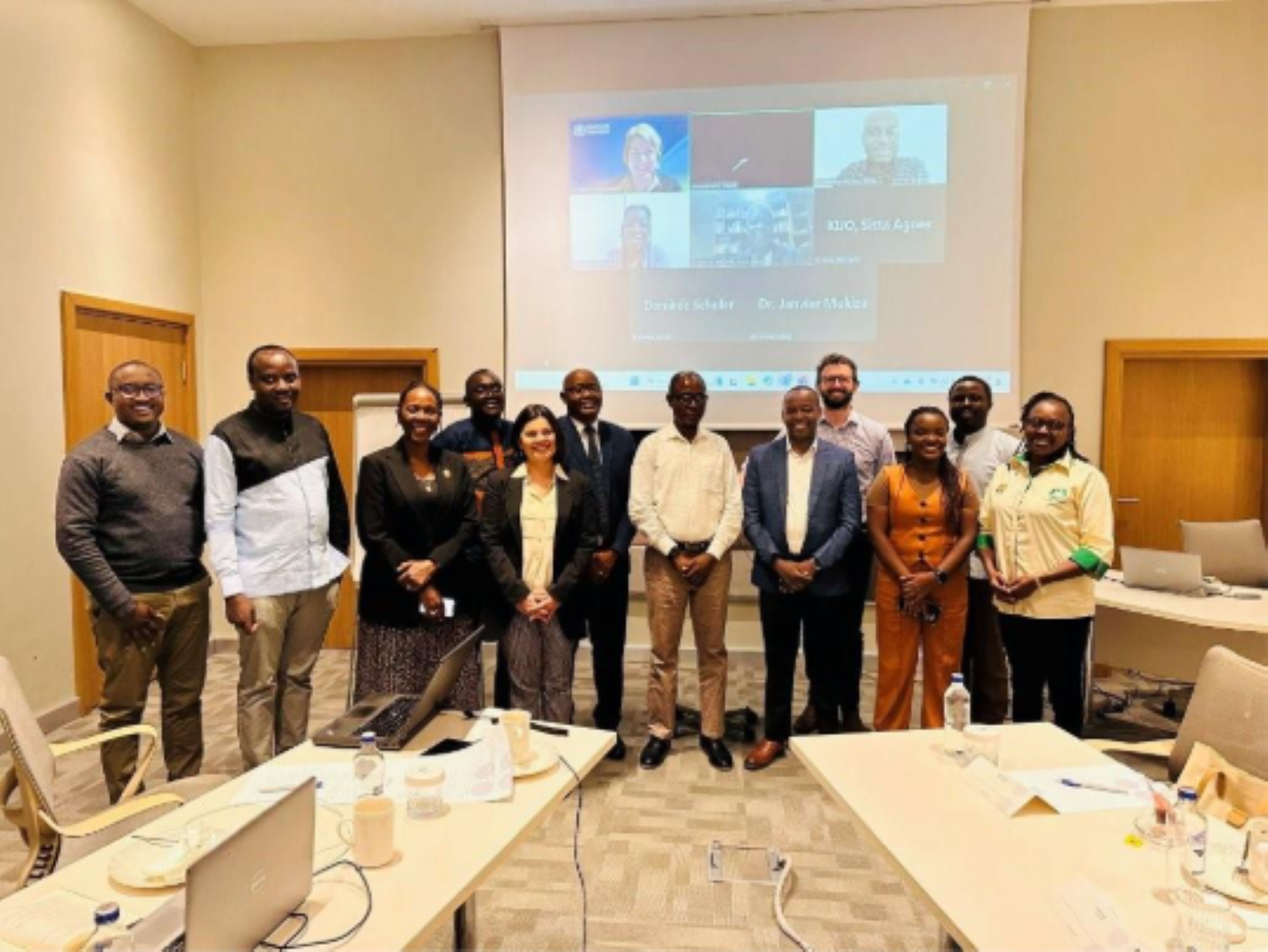 Experts standing in front of a screen